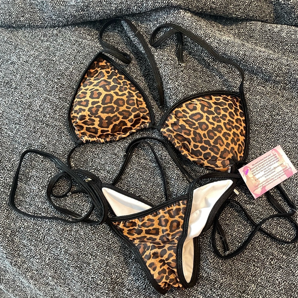 ACBikini Posing Suit. Never Worn. Includes breast Enhancers.
